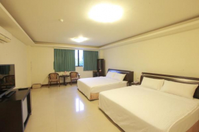 Гостиница Yong Qi Hotel  Хуален